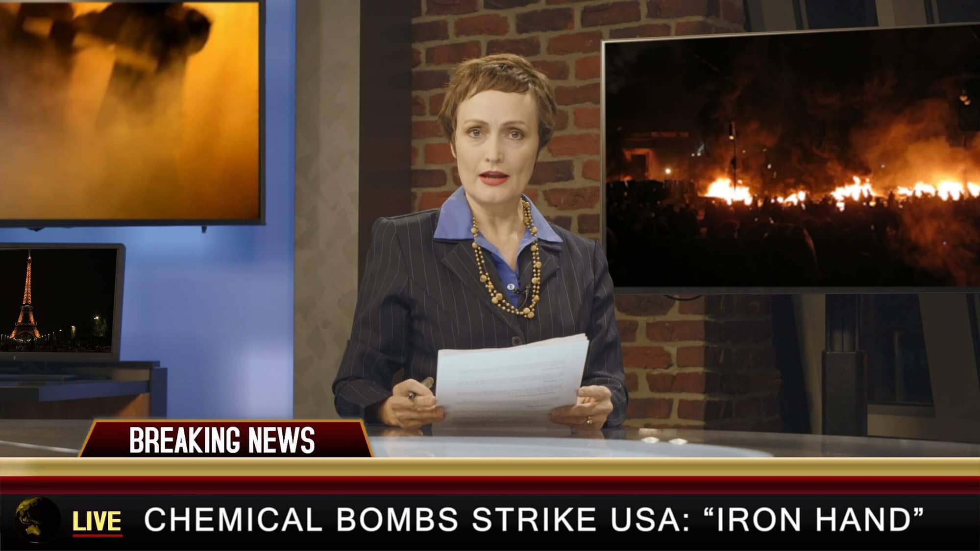 Still from Bug Out. Julie-Anne plays a news anchor reading a story next to war footage.